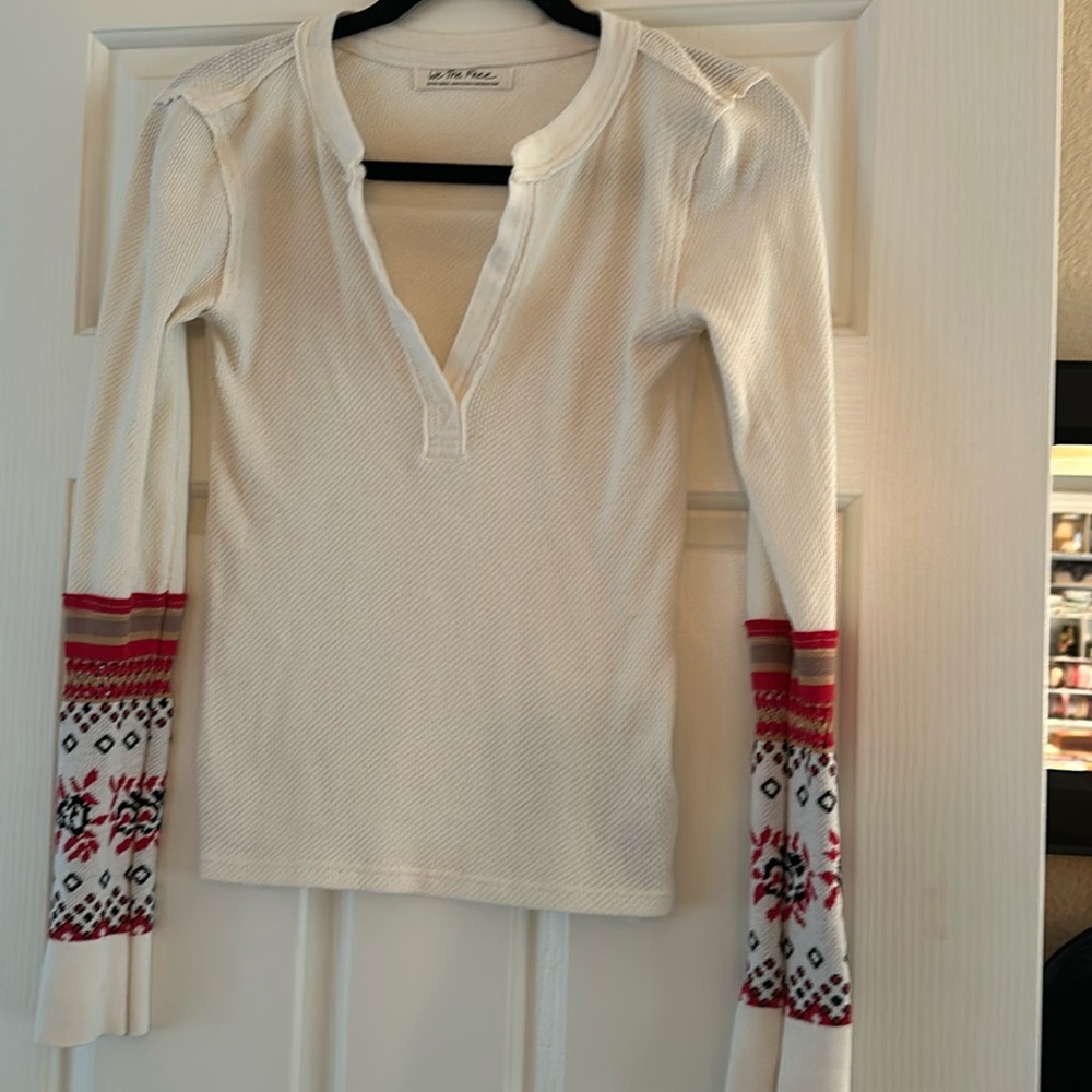 We the Free long sleeve thermal with decorative sleeves
Size XS worn one time.